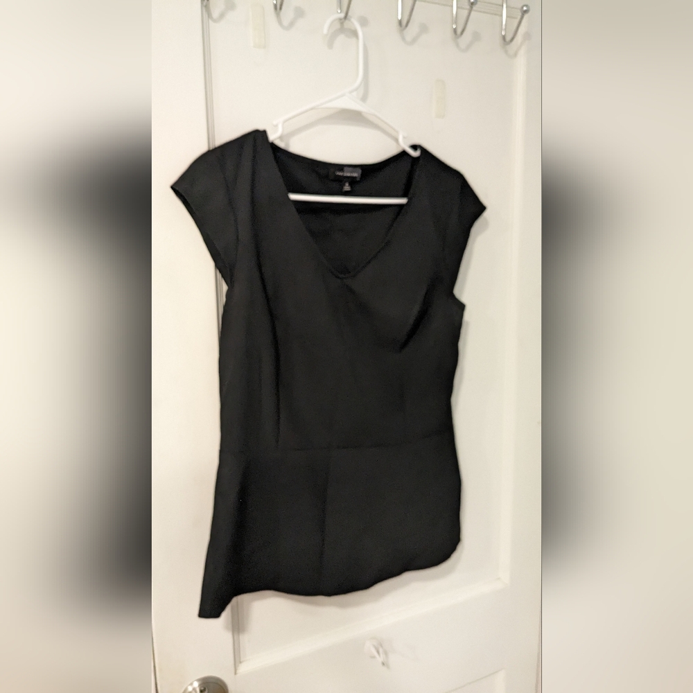 The limited peplum top. Medium, size 8. Dress blouse. Black
